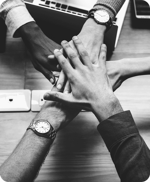 Team hands stacked in unity